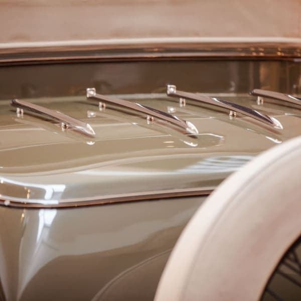 Cream coachwork, chromed louvers